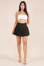 PLEATED SOLID COLORED MINI SKIRT WITH LINED SHORTS BLK Pic 1